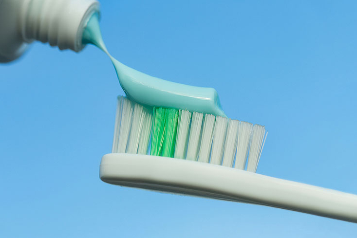 Toothpaste on a toothbrush.