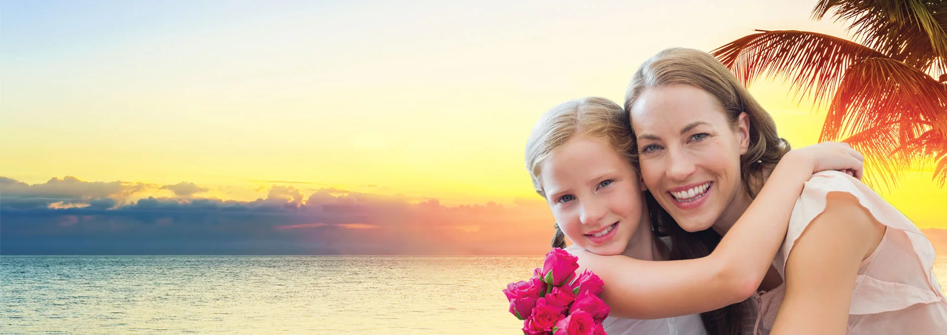 Woman and girl in sunset