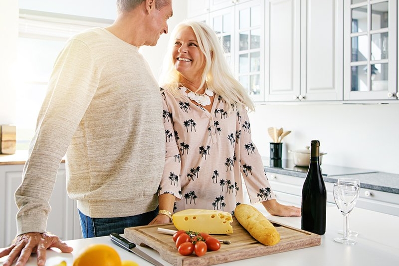 Couple discussing how cheese prevents tooth decay