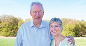 Senior Couple Smiling Outside