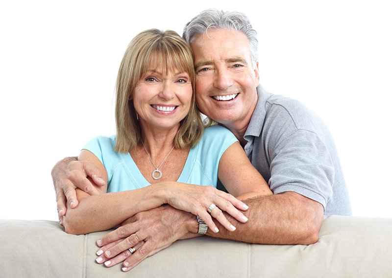 Senior Happy Couple With Dental Implants From Seven Springs Dental Excellence